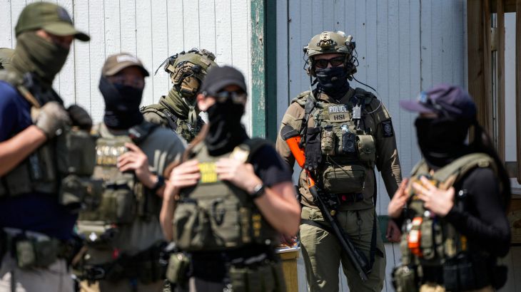 Israeli military intercepts Hezbollah aerial assault, causing damage in Kiryat Shmona.